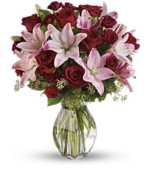Love Bouquet with Long Stemmed Roses. An arrangement by Tallevast Florist.