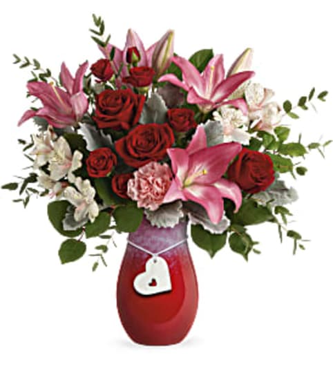 Charmed 'n Love. An arrangement by Palmetto Gardens Florist.