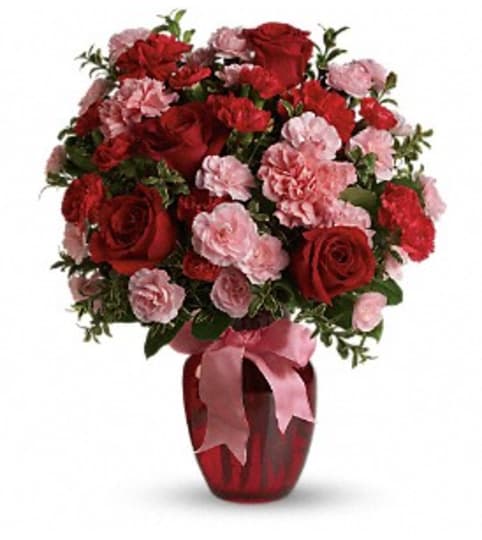 Dances with me. An arrangement by Palmetto Gardens Florist.