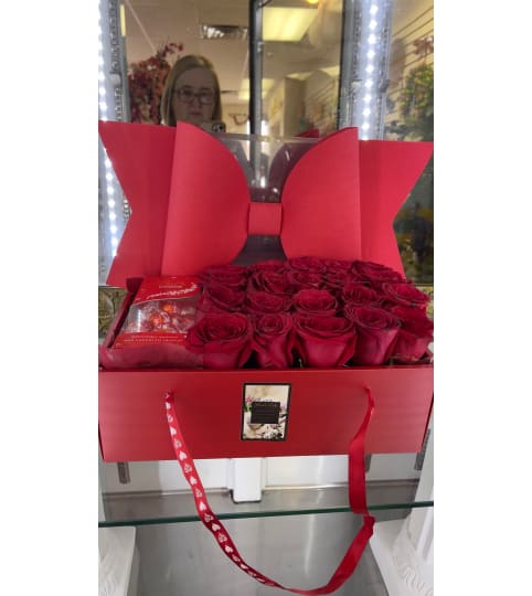 Red Purse with fresh red roses