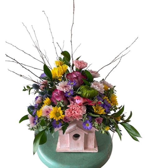 Blooms and Birds. An arrangement by Loyalist Flowers.