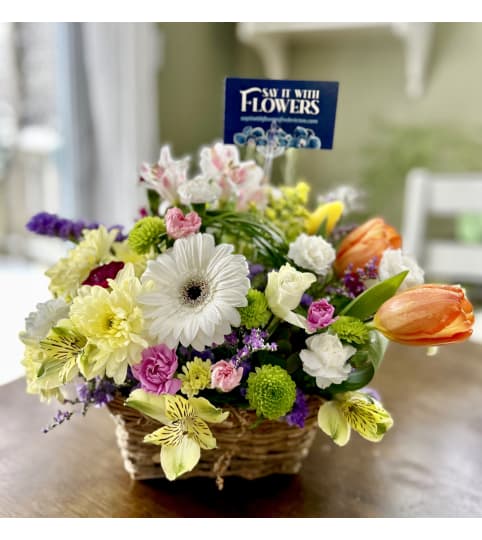 Seasonal Flowers Arrangement. An arrangement by Say It With Flowers.