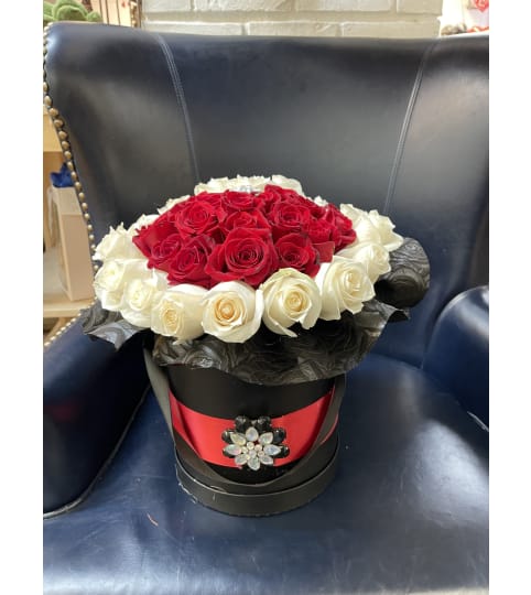 Boxed Loved. An arrangement by Rose Flowers.
