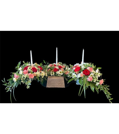 Sectional Urn Piece. An arrangement by Loyalist Flowers.