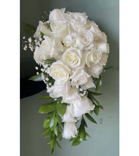 Cascading Bridal Bouquet. An arrangement by Rose Flowers.