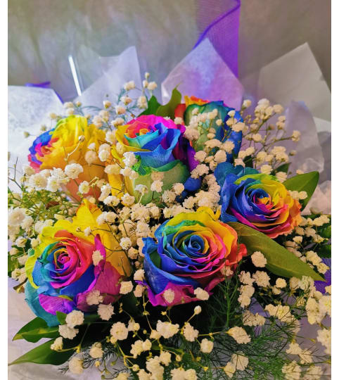 3/6/9 RAINBOW ROSE BOUQUET. An arrangement by Triple A Florist.