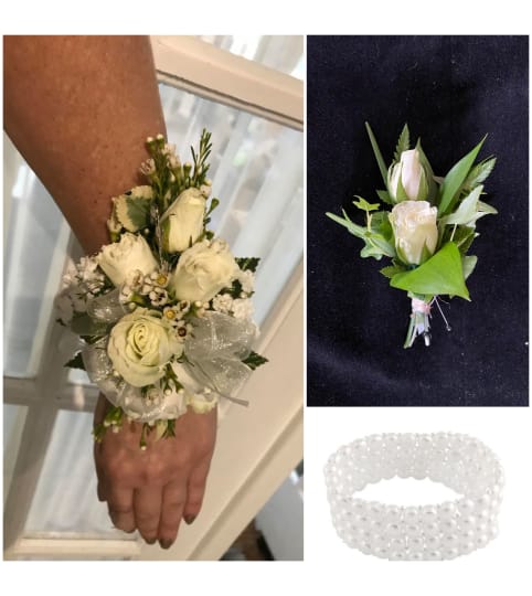 Follow Your Dreams- Roses Corsage and Boutonniere Pair. An arrangement by Loyalist Flowers.