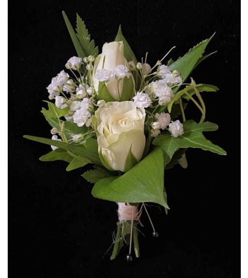 Lapel Boutonniere. An arrangement by Loyalist Flowers.