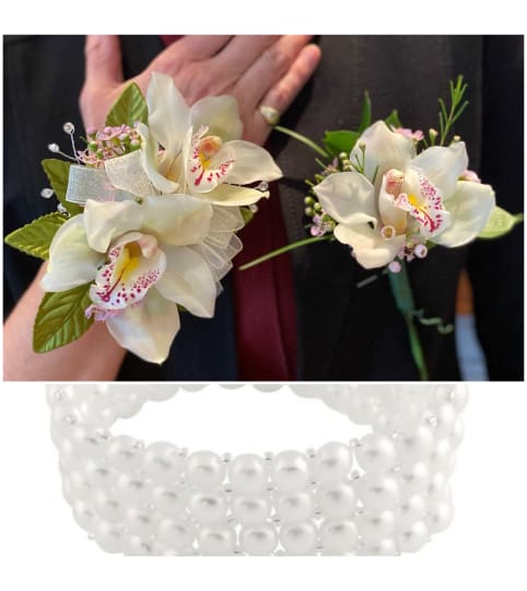 Orchid Perfect Pair Wristlet and Boutonierre. An arrangement by Loyalist Flowers.