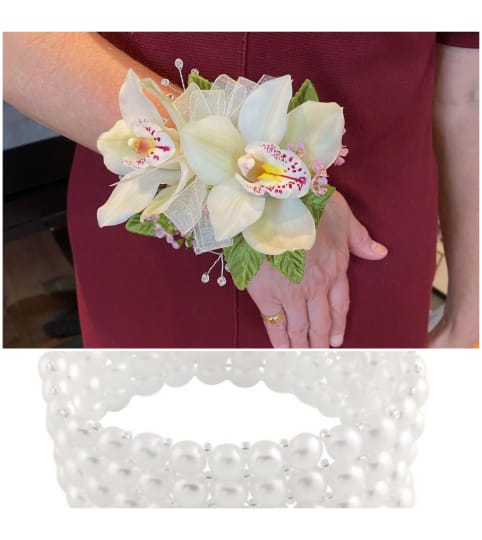 Elegant Orchid Wristlet. An arrangement by Loyalist Flowers.