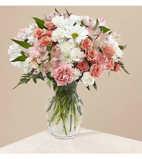 Blush by You. An arrangement by Geni's Florist and Gifts.