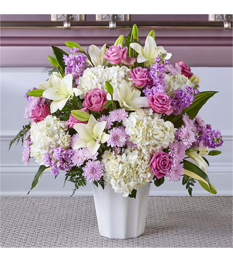 Lavender Dreams Floor Basket. An arrangement by Geni's Florist and Gifts.
