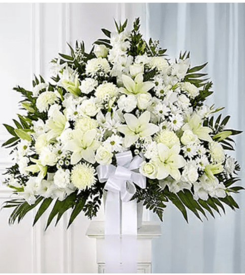 Heartfelt Sympathy Standing Basket- White. An arrangement by Garden Florist.