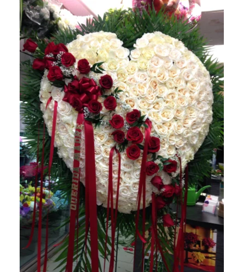 Bleeding Heart White Roses By Garden Florist