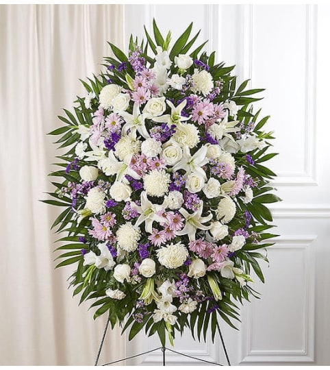 Garden Lavender and White Standing Spray. An arrangement by Garden Florist.