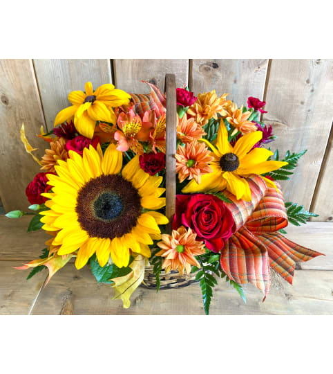 Fall Bounty Basket. An arrangement by Mayfield Flowers.