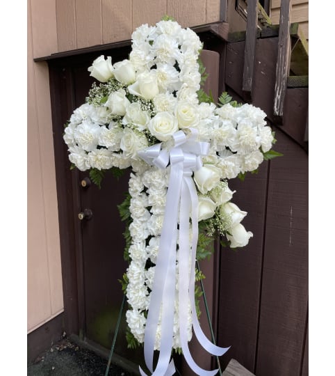 Blessings Cross. An arrangement by Violeta's Flower Shop.