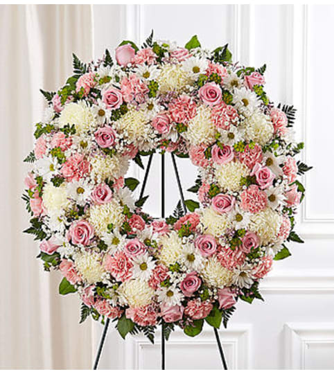 Garden Serene Blessings Standing Wreath- Pink and White. An arrangement by Garden Florist.