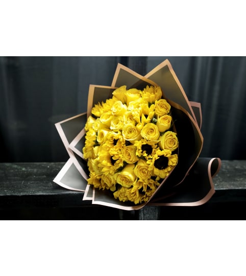 Yellow Rose and Sunflower Buchon Bouquet. An arrangement by BellaRosa Gardens.