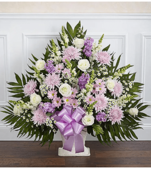 Lavender and White Floor Basket Arrangement. An arrangement by Garden Florist.