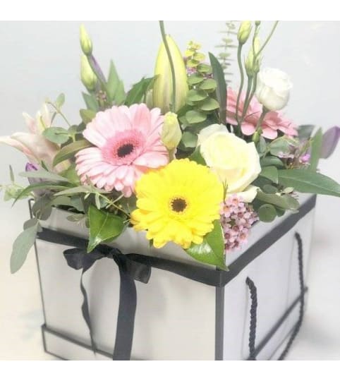 Signature Collection Wedding Tuxedo. An arrangement by Arum Lily Flower Shop Edmonton.