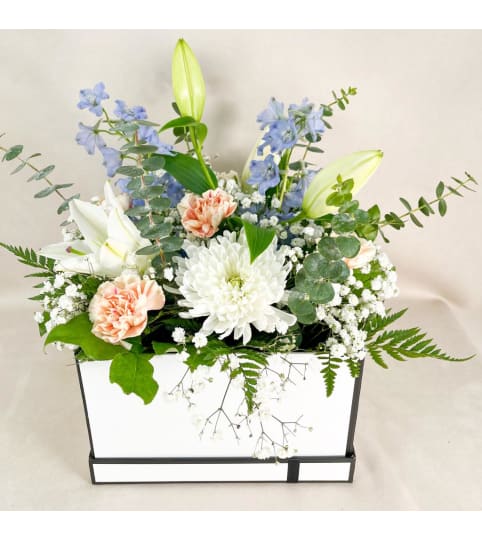 Signature Collection Edmonton. An arrangement by Arum Lily Flower Shop Edmonton.