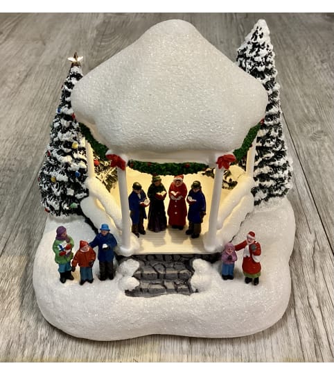 Sweet Sounds of Christmas Kinkade Ornament. An arrangement by Roma Flowers and Gifts.