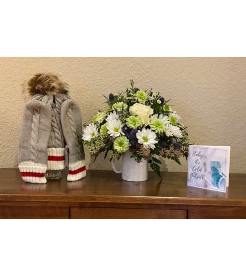 Baby It's Getting Cold Outside. An arrangement by Loyalist Flowers.