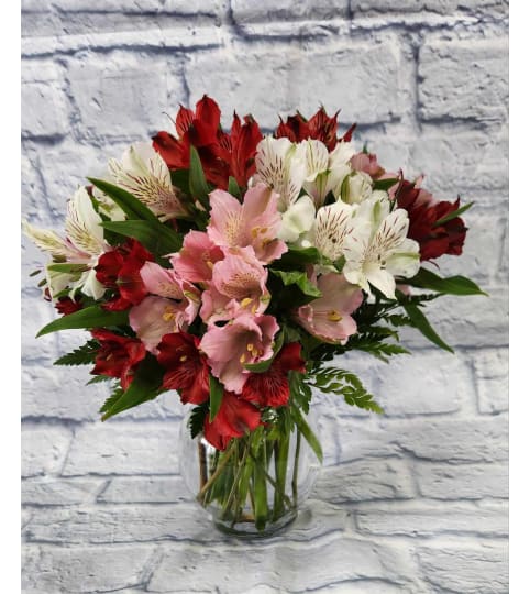 Love Alstromeria Lilies. An arrangement by Clemmons Florist Inc..