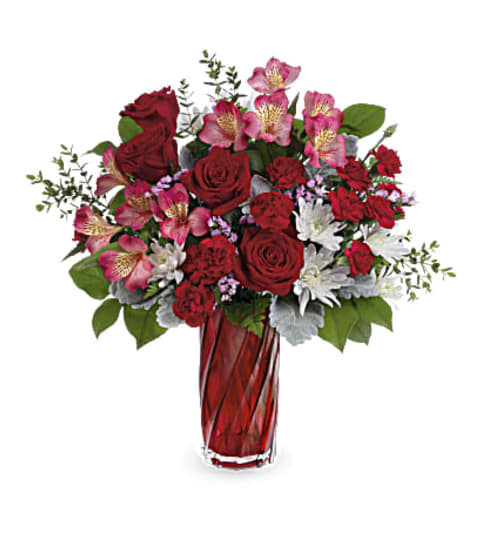 Loves Swirling Devotion. An arrangement by L and J Blooms.