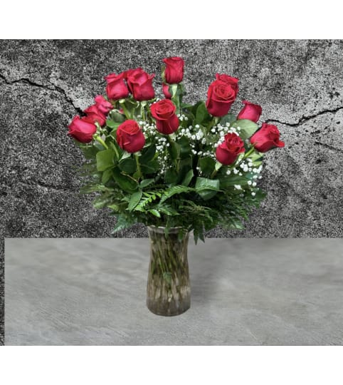 Roses Red Roses. An arrangement by Massey's House of Flowers.