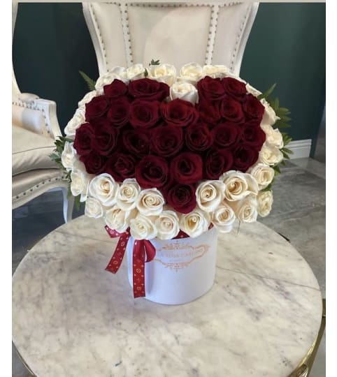 MY HEART IS YOURS 50 ROSE HEART BOX. An arrangement by BellaRosa Gardens.