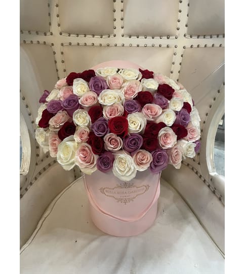 MIX COLORED ROSES BOX. An arrangement by BellaRosa Gardens.