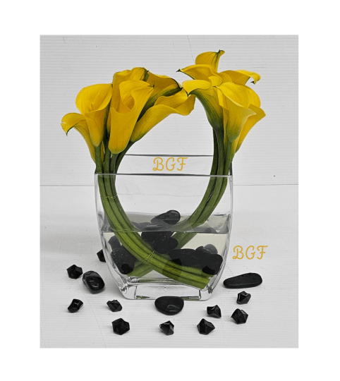 Modern Yellow Calla. An arrangement by Brickell Exclusive Blooms.