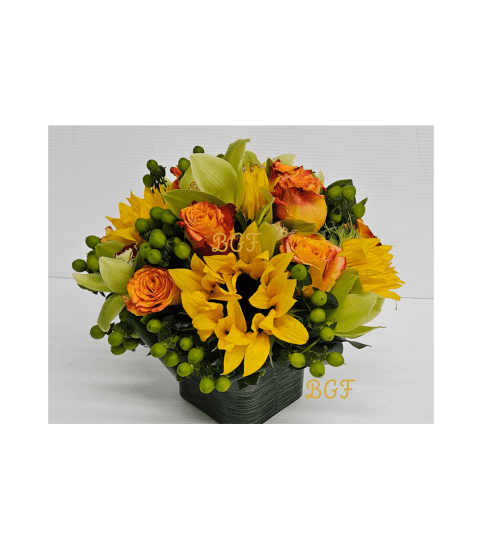Cymbidium Sunflower Rose Unique. An arrangement by Brickell Exclusive Blooms.