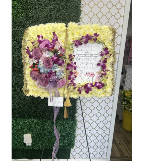 Bible tribute. An arrangement by Cielo's Floral Designs.