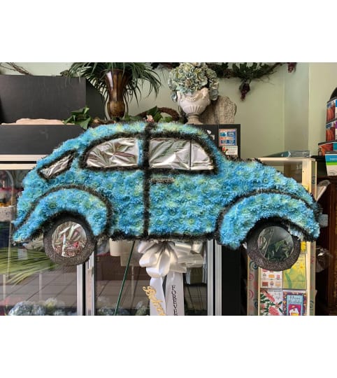 Car tribute. An arrangement by Cielo's Floral Designs.
