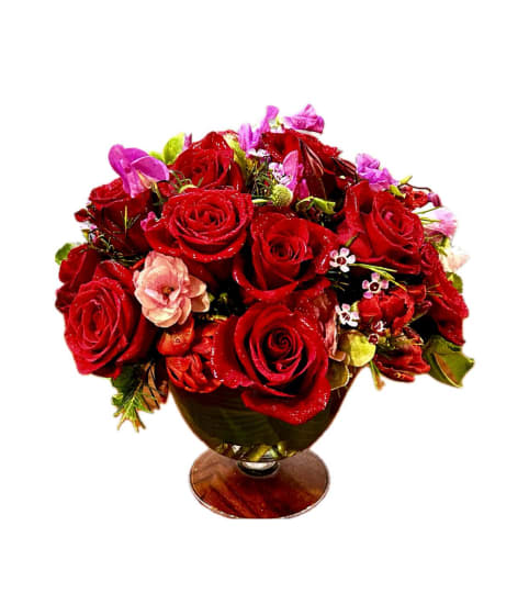 Inti-Small red mix arrangement. An arrangement by Inti-Raymi Flowers.