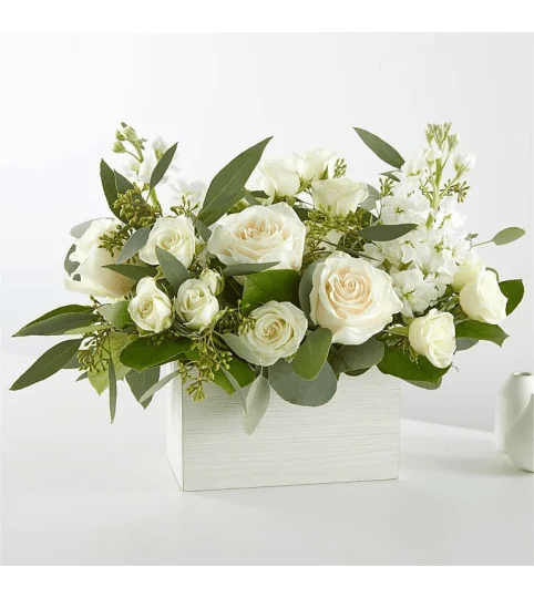 Sentimental In White. An arrangement by Anthurium Gardens Florist.