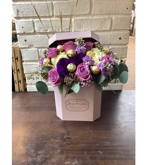Blooms and Chocolate Box. An arrangement by Rose Flowers.
