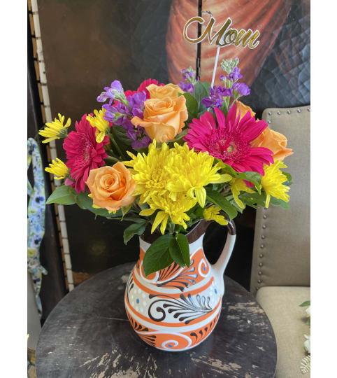 Bloomed Pitcher. An arrangement by Rose Flowers.