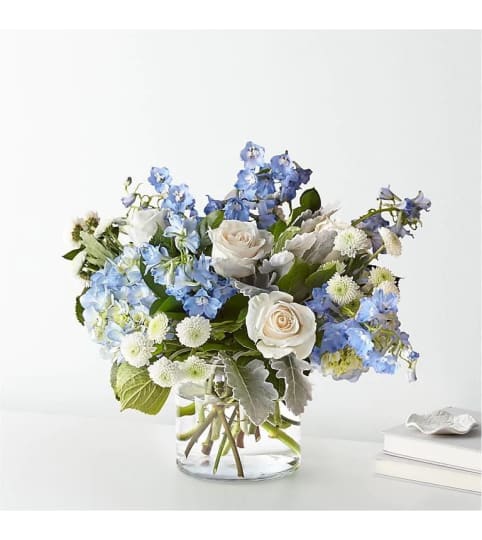 Elegant White and Blue. An arrangement by Brickell Exclusive Blooms.