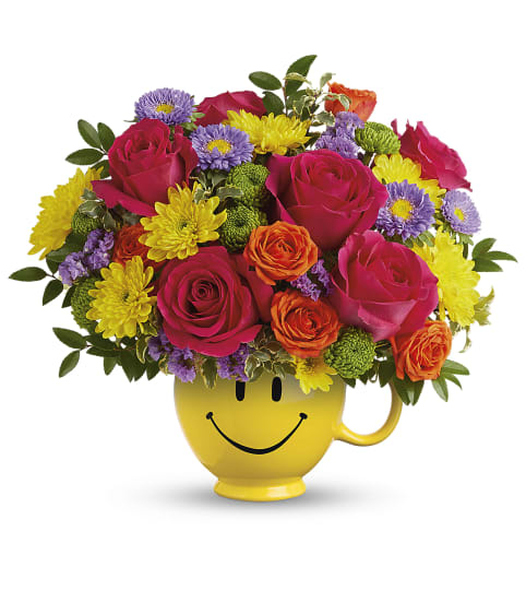 Teleflora's Choose Happy Bouquet. An arrangement by Sueppel's Flowers.