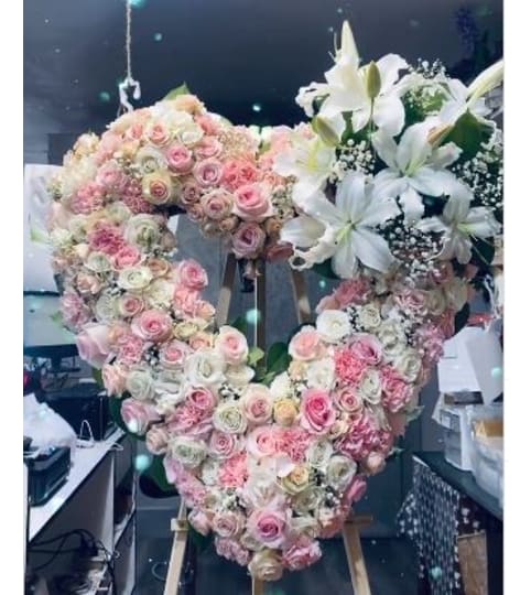 Premium Heart. An arrangement by Geni's Florist and Gifts.
