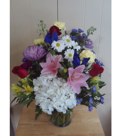 Heatherton's Florist Daily Deal Vase. An arrangement by Heatherton's Florist and Gifts.