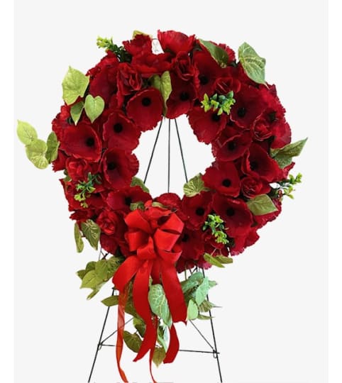 Everlasting Red Poppy and Cardinal Wreath. An arrangement by Loyalist Flowers.