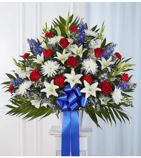 Standing Basket - Red, white and Blue. An arrangement by Garden Florist.