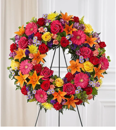 Standing Wreath, Bright Colors. An arrangement by Garden Florist.
