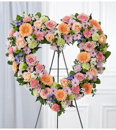 Garden Always Remember Floral Heart Tribute- Pastel. An arrangement by Garden Florist.