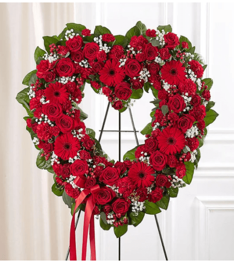 Garden Always Remember Floral Heart Tribute- Red. An arrangement by Garden Florist.